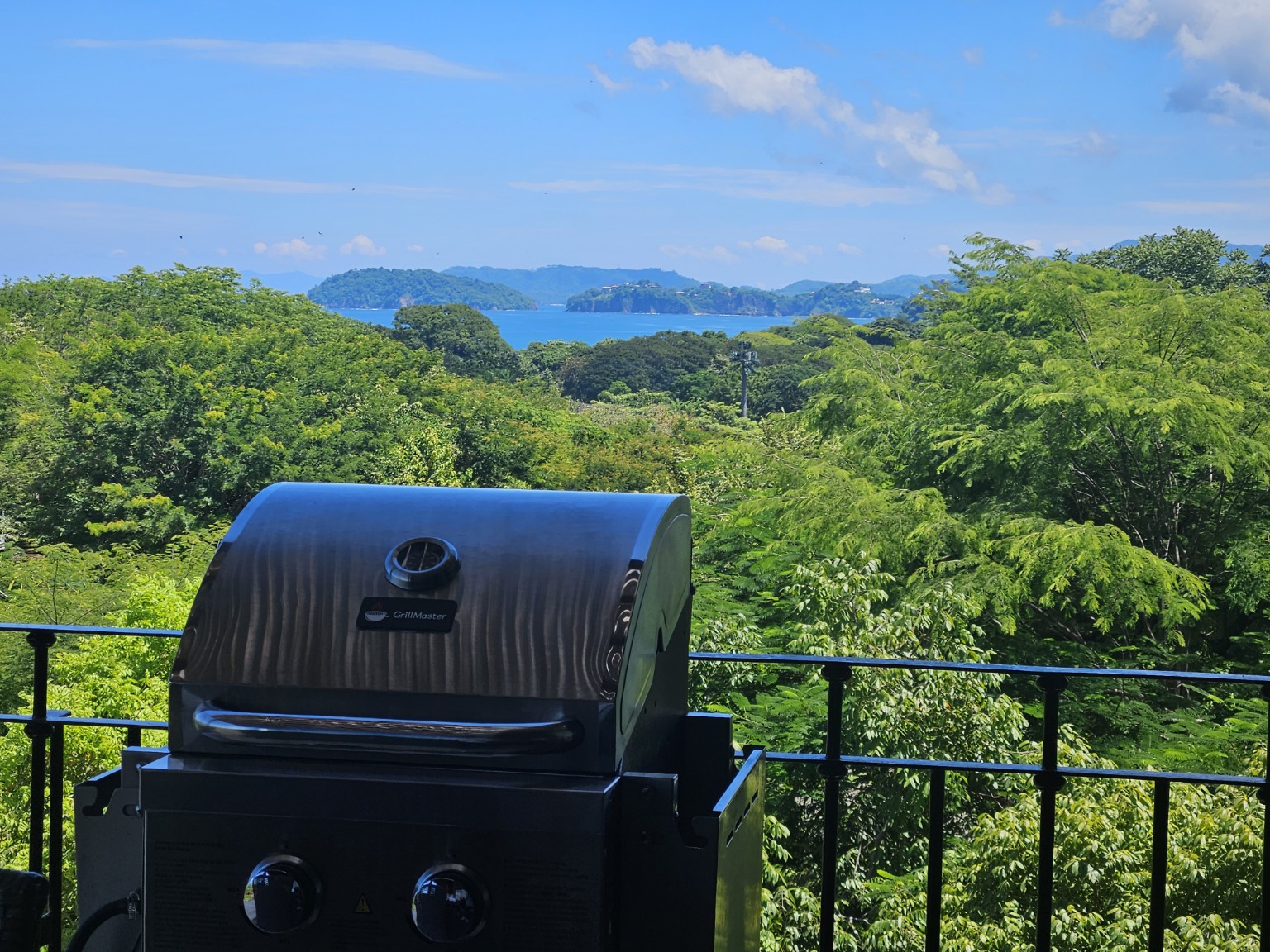 Serenity terrace grill and outdoor living with tropical ocean view
